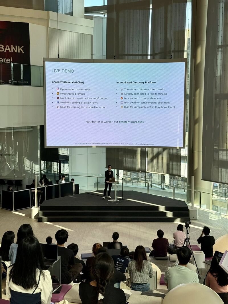 Audience watching the live demo on stage